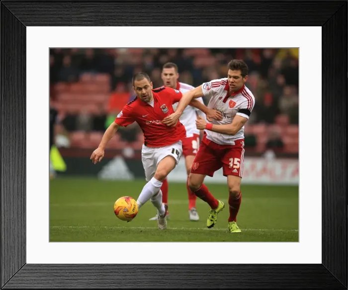 Framed Print : Battling for the Ball: Hammond vs. Cole - Sky Bet League One Rivalry at Bramall Lane Framed Print : Battling for the Ball: Hammond vs. Cole - Sky Bet League One Rivalry at Bramall Lane