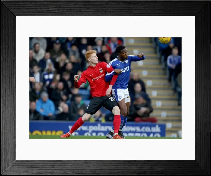 Framed Print : Intense Rivalry: Jordan Willis vs. Gboly Ariyibi in Coventry City's League One Battle at Chesterfield Framed Print : Intense Rivalry: Jordan Willis vs. Gboly Ariyibi in Coventry City's League One Battle at Chesterfield