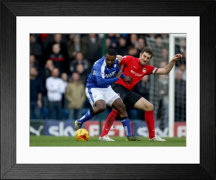 Framed Print : Intense Rivalry: Sam Ricketts vs Sylvan Ebanks-Blake in Coventry City's League One Clash at Chesterfield