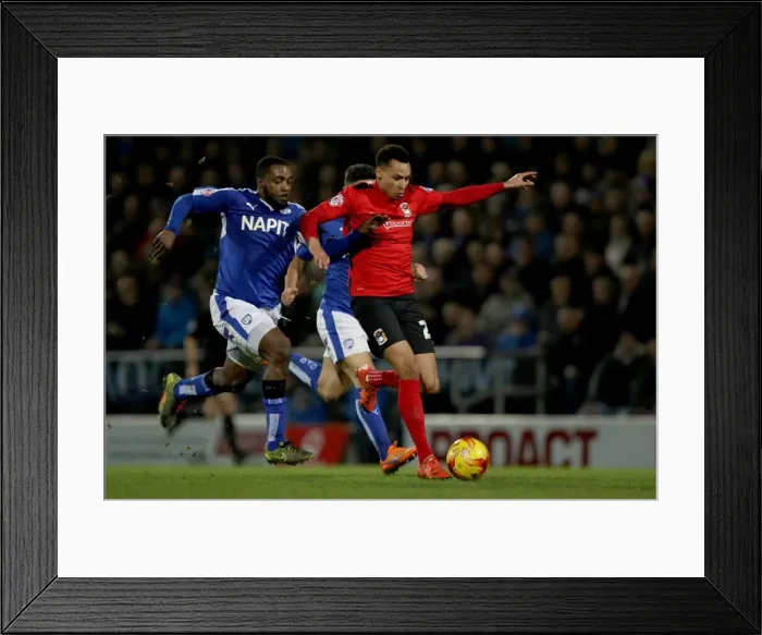 Framed Print : Intense Rivalry: Murphy vs Ebanks-Blake's Fierce Tackle in Coventry City's League One Clash at Chesterfield Framed Print : Intense Rivalry: Murphy vs Ebanks-Blake's Fierce Tackle in Coventry City's League One Clash at Chesterfield