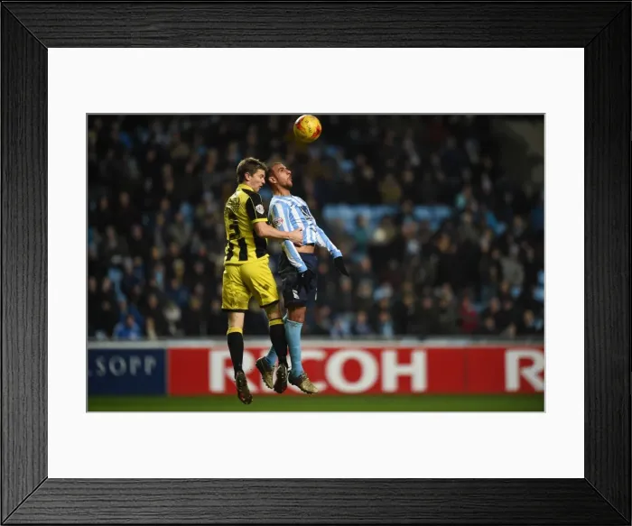 Framed Print : Intense Battle: Tudgay vs Cansdell-Sherriff in Coventry City vs Burton Albion (Sky Bet League One) Framed Print : Intense Battle: Tudgay vs Cansdell-Sherriff in Coventry City vs Burton Albion (Sky Bet League One)