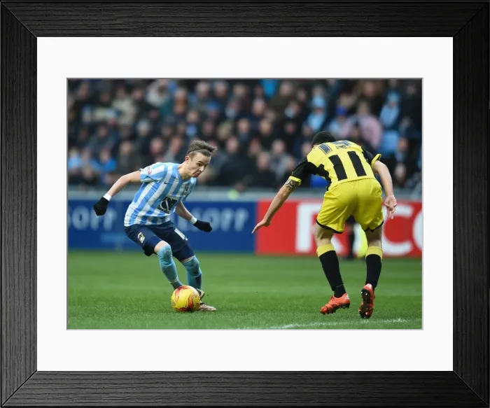 Framed Print : James Maddison vs. Anthony O'Connor: A Riveting Midfield Showdown in Coventry City's Sky Bet League One Clash against Burton Albion Framed Print : James Maddison vs. Anthony O'Connor: A Riveting Midfield Showdown in Coventry City's Sky Bet League One Clash against Burton Albion