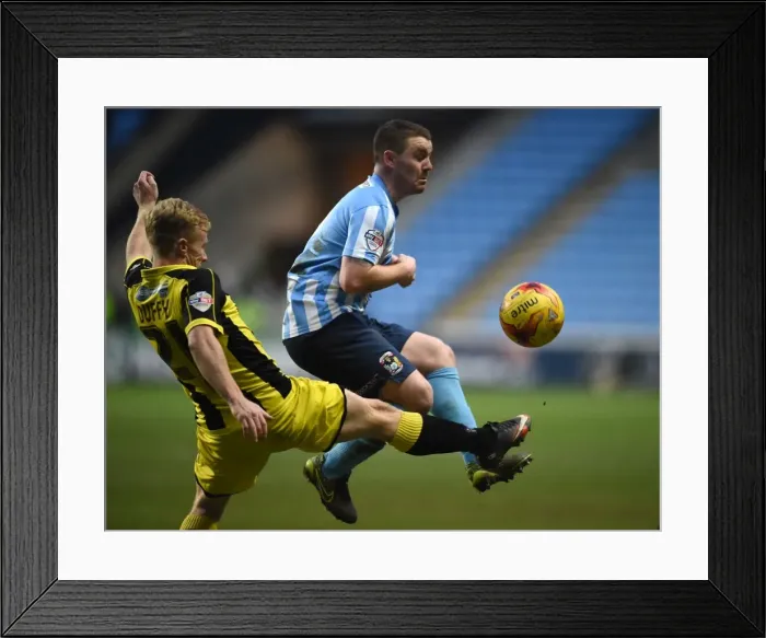 Framed Print : Intense Rivalry: Mark Duffy vs John Fleck Battle in Coventry City vs Burton Albion League One Clash at Ricoh Arena Framed Print : Intense Rivalry: Mark Duffy vs John Fleck Battle in Coventry City vs Burton Albion League One Clash at Ricoh Arena