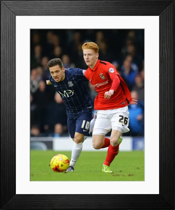 Framed Print : Intense Rivalry: Haynes vs Payne in Coventry City's Sky Bet League One Clash at Roots Hall Framed Print : Intense Rivalry: Haynes vs Payne in Coventry City's Sky Bet League One Clash at Roots Hall