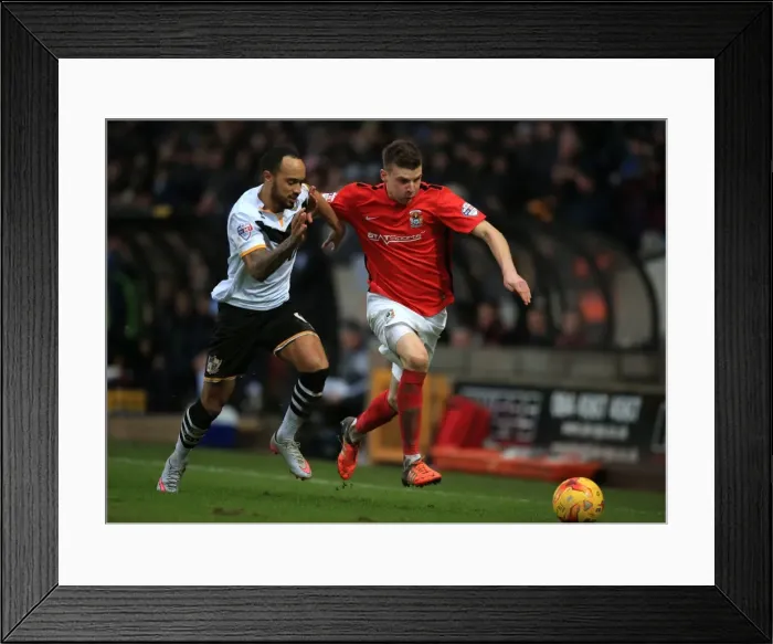Framed Print : Battle at Vale Park: Byron Moore vs. Chris Stokes - Sky Bet League One Clash Framed Print : Battle at Vale Park: Byron Moore vs. Chris Stokes - Sky Bet League One Clash