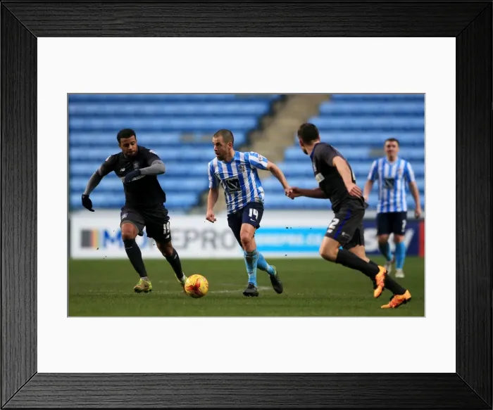 Framed Print : Joe Cole Battles Past Defenders in Coventry City's Sky Bet League One Clash Against Bury