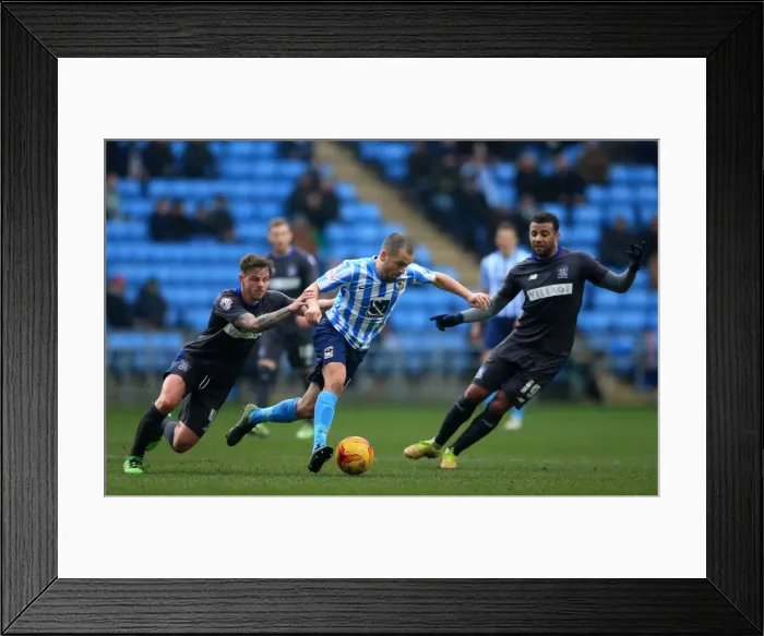 Framed Print : Joe Cole Battles Past Bury Defenders in Coventry City's League One Clash Framed Print : Joe Cole Battles Past Bury Defenders in Coventry City's League One Clash