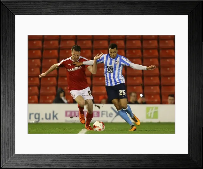 Framed Print : Intense Rivalry: Marley Watkins vs. Jacob Murphy in Sky Bet League One Clash at Oakwell Framed Print : Intense Rivalry: Marley Watkins vs. Jacob Murphy in Sky Bet League One Clash at Oakwell