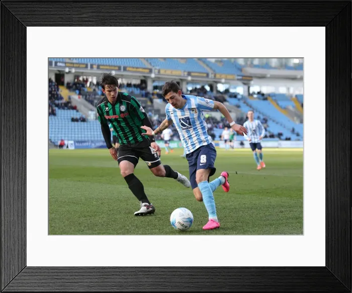 Framed Print : Ruben Lameiras vs. Niall Canavan: A Battle in Sky Bet League One at Coventry City's Ricoh Arena
