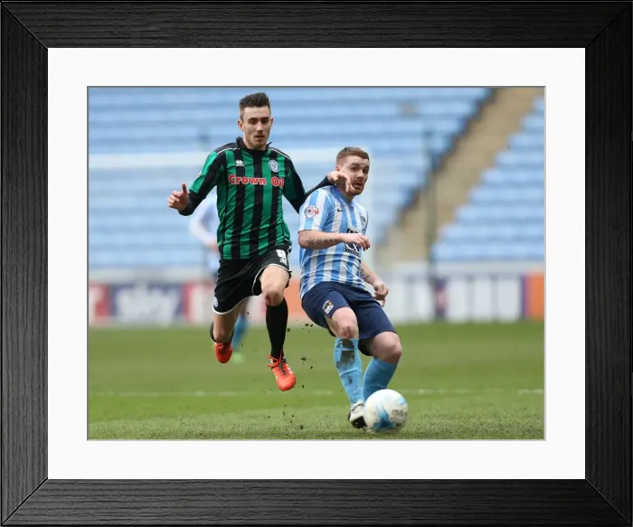 Framed Print : Clash of Midfield Titans: John Fleck vs Matty Lund in Sky Bet League One at the Ricoh Arena Framed Print : Clash of Midfield Titans: John Fleck vs Matty Lund in Sky Bet League One at the Ricoh Arena