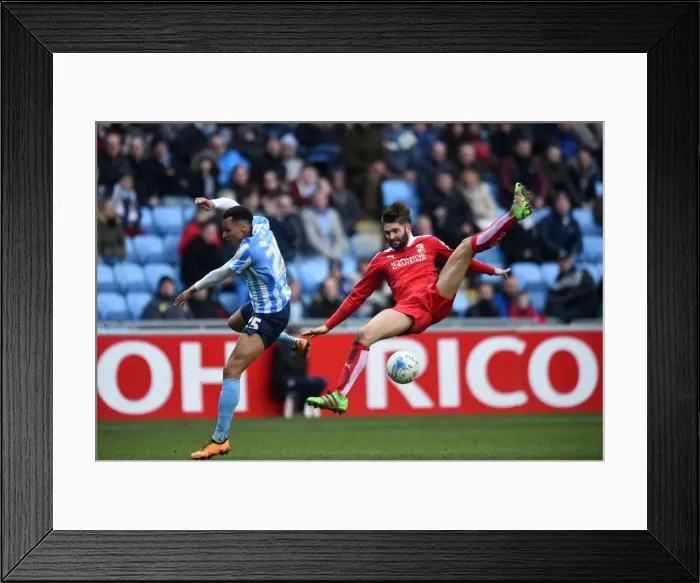 Framed Print : Coventry City vs Swindon Town Rivalry: Jacob Murphy vs Jordan Turnbull Clash in Sky Bet League One