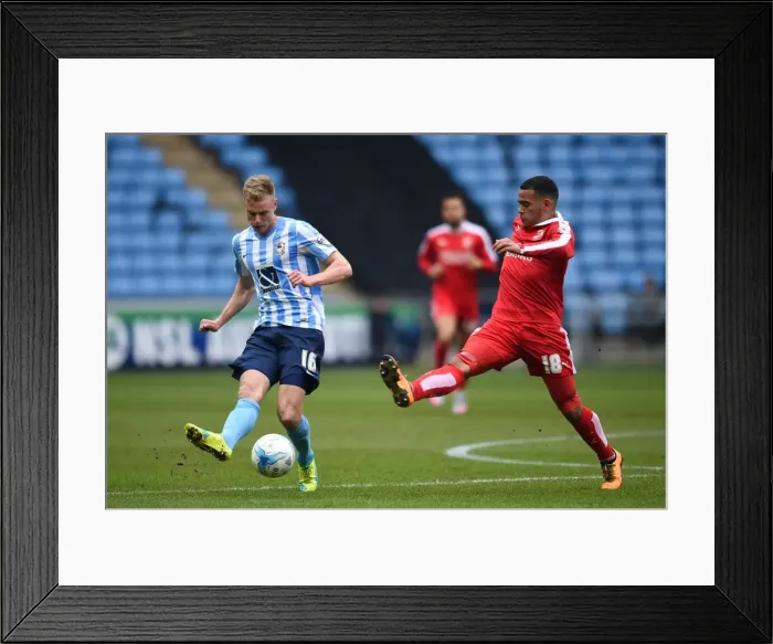 Framed Print : Coventry City vs Swindon Town: Clash at Ricoh Arena - Andy Rose vs Louis Thompson Framed Print : Coventry City vs Swindon Town: Clash at Ricoh Arena - Andy Rose vs Louis Thompson