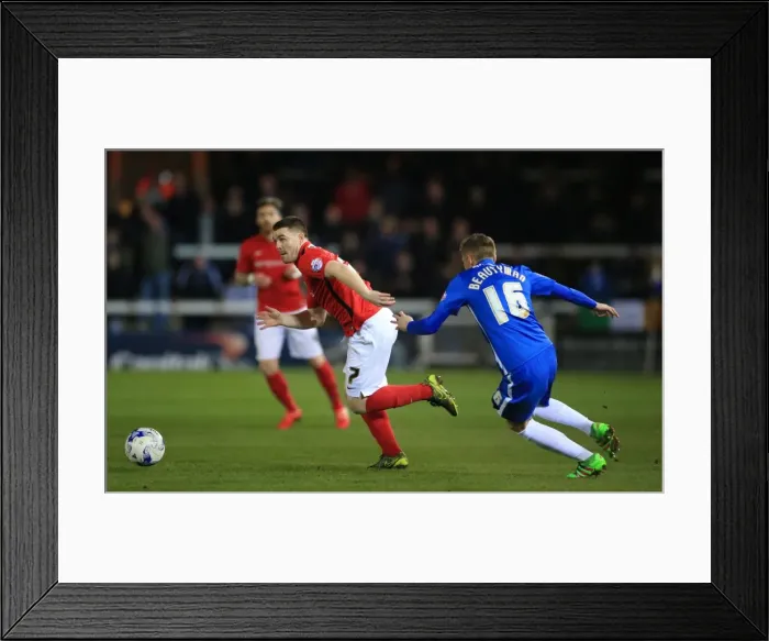 Framed Print : Intense Moment: John Fleck Charges Towards Harry Beautyman in Sky Bet League One Match at ABAX Stadium Framed Print : Intense Moment: John Fleck Charges Towards Harry Beautyman in Sky Bet League One Match at ABAX Stadium