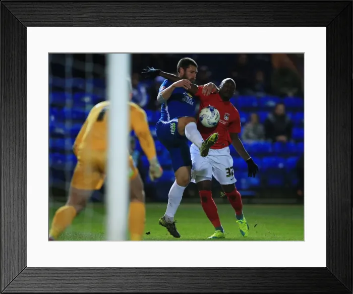 Framed Print : Michael Bostwick vs Marc Antoine Fortune: Intense Battle for Ball Possession in Peterborough United vs Coventry City, Sky Bet League One Framed Print : Michael Bostwick vs Marc Antoine Fortune: Intense Battle for Ball Possession in Peterborough United vs Coventry City, Sky Bet League One