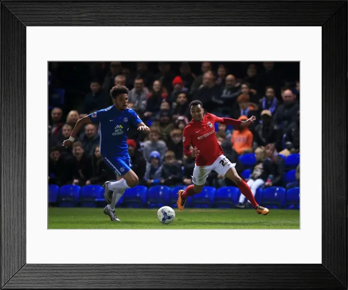 Framed Print : Jacob Murphy Charges Forward Against Ricardo Almeida Santos in Sky Bet League One: Peterborough United vs Coventry City at ABAX Stadium Framed Print : Jacob Murphy Charges Forward Against Ricardo Almeida Santos in Sky Bet League One: Peterborough United vs Coventry City at ABAX Stadium