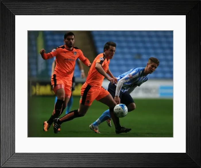 Framed Print : Martin Lorentzson vs Nick Shorey: Intense Rivalry in Coventry City vs Colchester United, Sky Bet League One, Ricoh Arena Framed Print : Martin Lorentzson vs Nick Shorey: Intense Rivalry in Coventry City vs Colchester United, Sky Bet League One, Ricoh Arena