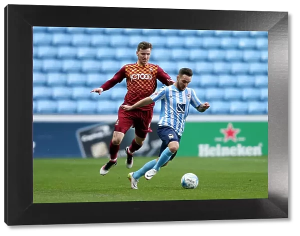 Clash at Ricoh Arena: Coventry City vs. Bradford City - Intense Moment between Adam Armstrong and Lee Evans