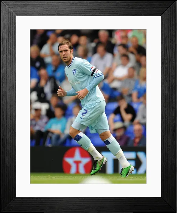 Framed Print : Richard Keogh of Coventry City Faces Off Against Birmingham City in Npower Championship Match at St. Andrew's - August 13, 2011