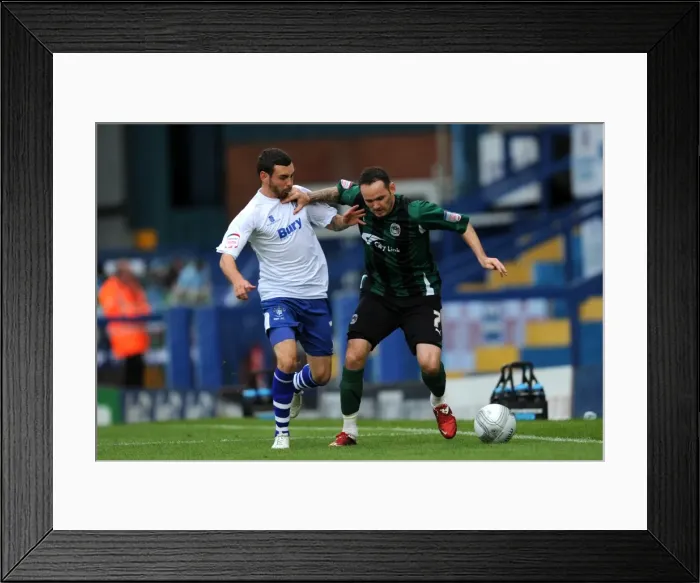 Framed Print : David Worrall vs. David Bell: Intense Battle for the Carling Cup Ball at Gigg Lane - Bury vs. Coventry City