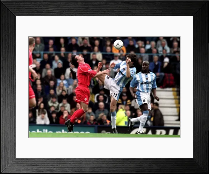 Framed Print : Coventry City vs Liverpool: Gary Breen Stuns Robbie Fowler with a Powerful Headbutt (28-04-2001) Framed Print : Coventry City vs Liverpool: Gary Breen Stuns Robbie Fowler with a Powerful Headbutt (28-04-2001)