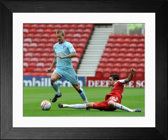 Framed Print : Rhys Williams vs. Carl Baker: Intense Battle at the Riverside - Coventry City vs. Middlesbrough, Football League Championship (2011) Framed Print : Rhys Williams vs. Carl Baker: Intense Battle at the Riverside - Coventry City vs. Middlesbrough, Football League Championship (2011)