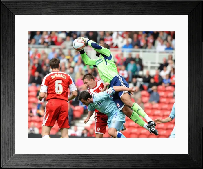 Framed Print : Middlesbrough vs Coventry City: Carl Ikeme Saves Roy O'Donovan's Header in Championship Clash at Riverside Stadium Framed Print : Middlesbrough vs Coventry City: Carl Ikeme Saves Roy O'Donovan's Header in Championship Clash at Riverside Stadium