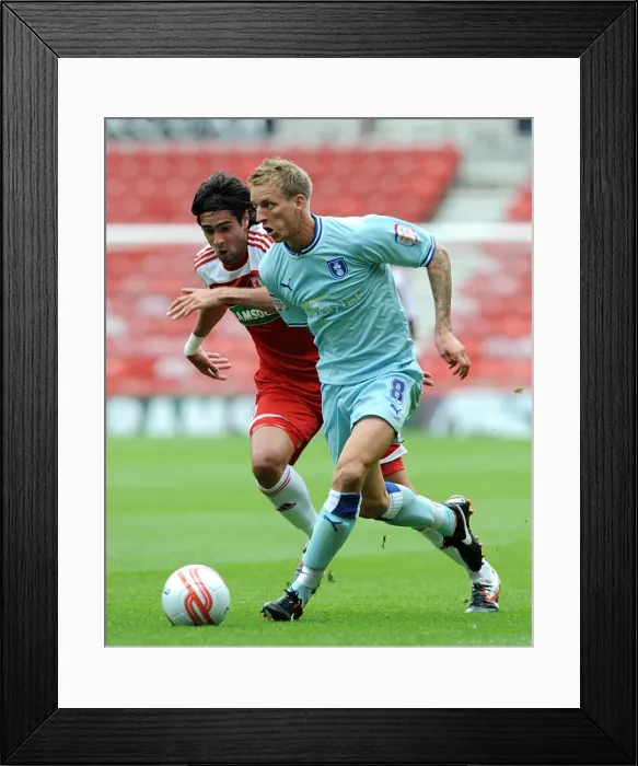 Framed Print : Middlesbrough vs Coventry City: Clash between Rhys Williams and Carl Baker in Championship Action Framed Print : Middlesbrough vs Coventry City: Clash between Rhys Williams and Carl Baker in Championship Action