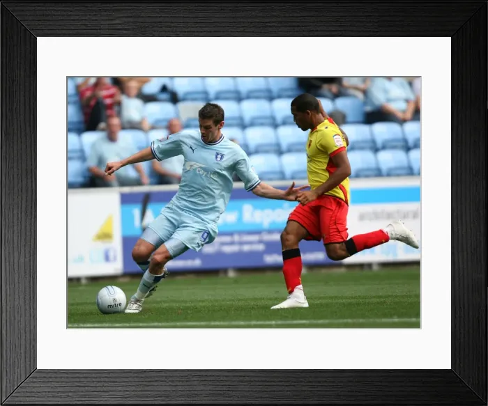 Framed Print : Coventry City vs. Watford: Clash between Jutkiewicz and Mariappa in the Npower Championship (20-08-2011, Ricoh Arena)