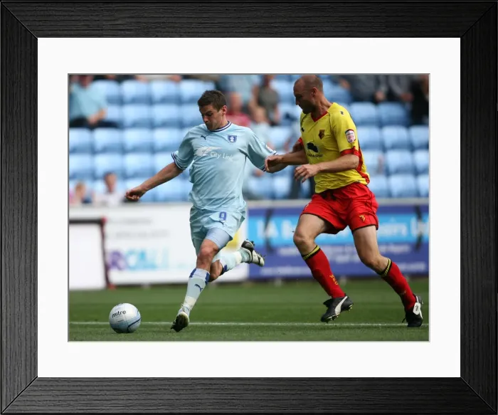 Framed Print : Coventry City vs. Watford: Clash between Lukas Jutkiewicz and Martin Taylor in the Npower Championship (20-08-2011, Ricoh Arena)