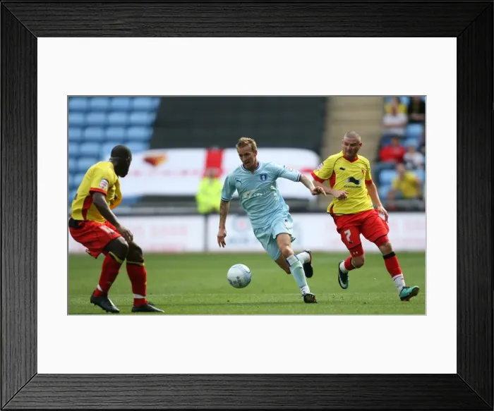 Framed Print : Coventry City vs. Watford: Carl Baker Tackles Watford's Defense in Npower Championship Match (20-08-2011, Ricoh Arena) Framed Print : Coventry City vs. Watford: Carl Baker Tackles Watford's Defense in Npower Championship Match (20-08-2011, Ricoh Arena)