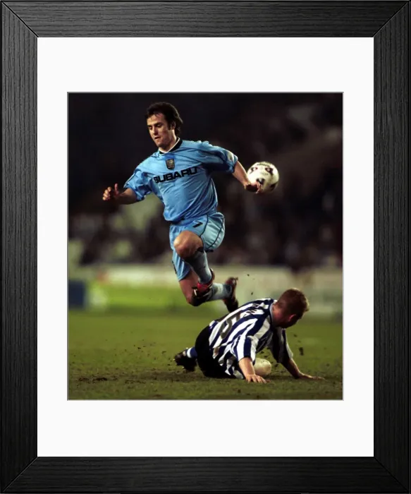 Framed Print : David Thompson vs. David Burrows: Intense Tackle in Coventry City's Clash with Sheffield Wednesday (Nationwide League Division One, 29-03-2002) Framed Print : David Thompson vs. David Burrows: Intense Tackle in Coventry City's Clash with Sheffield Wednesday (Nationwide League Division One, 29-03-2002)