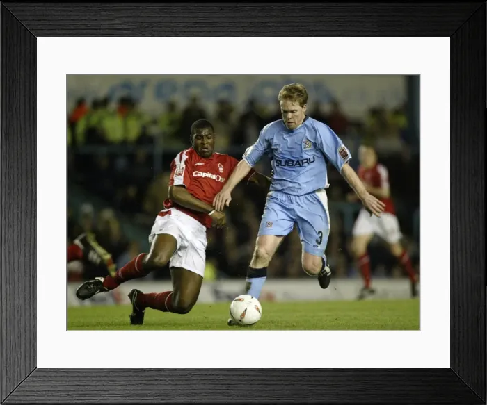 Framed Print : Clash at Highfield Road: Coventry City vs. Nottingham Forest - Steve Staunton vs. Wes Morgan in Championship Showdown (April 2005) Framed Print : Clash at Highfield Road: Coventry City vs. Nottingham Forest - Steve Staunton vs. Wes Morgan in Championship Showdown (April 2005)