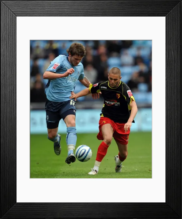 Framed Print : Coventry City vs Watford: Intense Battle for the Ball in the Championship - Aron Gunnarsson vs Henri Lansbury (Ricoh Arena, 02-05-2010) Framed Print : Coventry City vs Watford: Intense Battle for the Ball in the Championship - Aron Gunnarsson vs Henri Lansbury (Ricoh Arena, 02-05-2010)