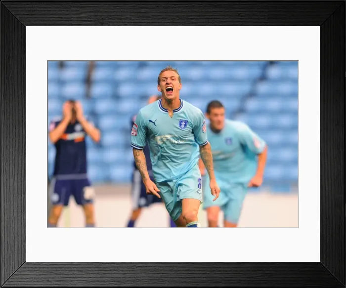 Framed Print : Carl Baker's Brace: Coventry City's Victory in Championship Clash Against Derby County (10-09-2011)