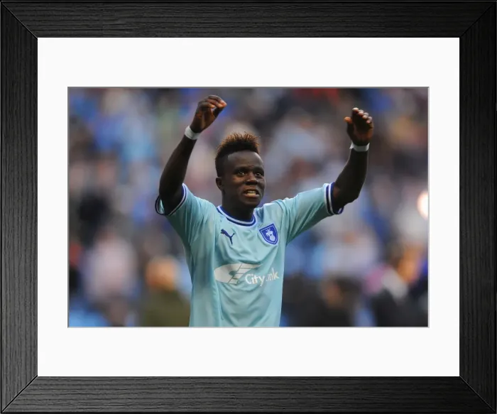 Framed Print : Coventry City FC: Gael Bigirimana's Victory Celebration vs. Derby County in Championship Match (10-09-2011) Framed Print : Coventry City FC: Gael Bigirimana's Victory Celebration vs. Derby County in Championship Match (10-09-2011)