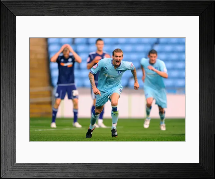 Framed Print : Coventry City's Double Victory: Carl Baker Scores the Second Goal Against Derby County in the Npower Championship (10-09-2011) Framed Print : Coventry City's Double Victory: Carl Baker Scores the Second Goal Against Derby County in the Npower Championship (10-09-2011)