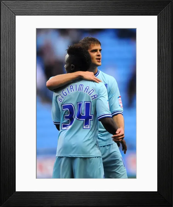 Framed Print : Coventry City FC: Gael Bigirimana and Martin Cranie Celebrate Championship Victory over Derby County (10-09-2011) Framed Print : Coventry City FC: Gael Bigirimana and Martin Cranie Celebrate Championship Victory over Derby County (10-09-2011)