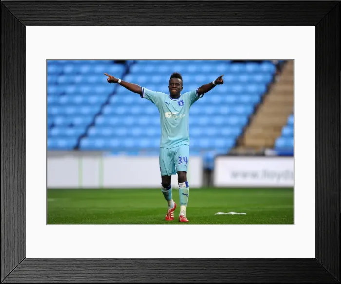 Framed Print : Coventry City FC: Gael Bigirimana's Triumphant Moment as Championship Champions Against Derby County (10-09-2011) Framed Print : Coventry City FC: Gael Bigirimana's Triumphant Moment as Championship Champions Against Derby County (10-09-2011)