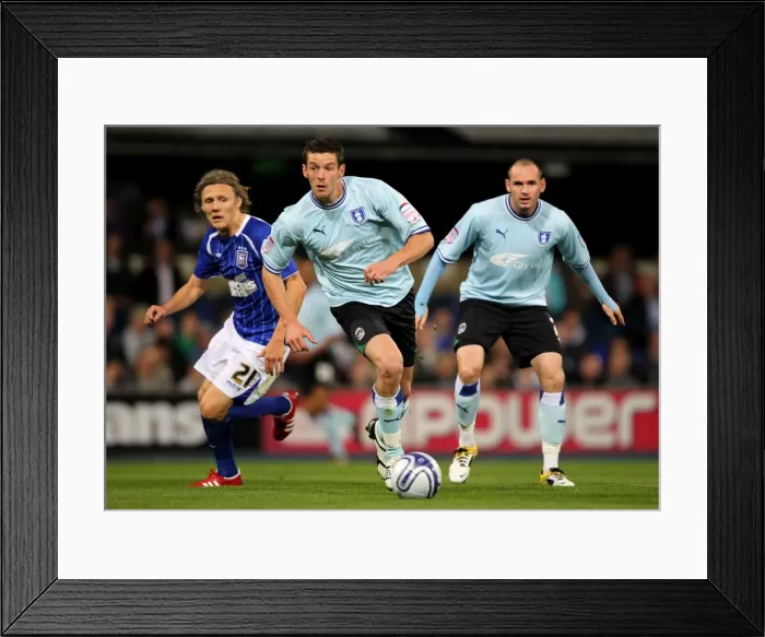 Framed Print : Lukas Jutkiewicz Escapes Jimmy Bullard: Coventry City vs Ipswich Town, Npower Championship (19-09-2011, Portman Road) Framed Print : Lukas Jutkiewicz Escapes Jimmy Bullard: Coventry City vs Ipswich Town, Npower Championship (19-09-2011, Portman Road)