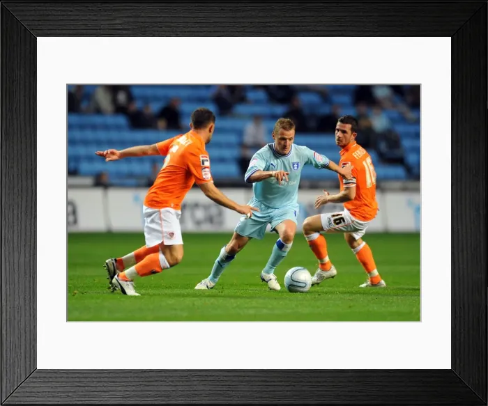 Framed Print : Clash at Ricoh Arena: Coventry City vs. Blackpool - Gary McSheffrey Faces Off Against Barry Ferguson and Neal Eardley Framed Print : Clash at Ricoh Arena: Coventry City vs. Blackpool - Gary McSheffrey Faces Off Against Barry Ferguson and Neal Eardley