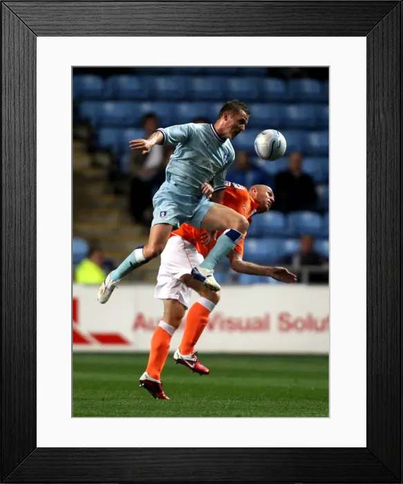 Framed Print : Gary McSheffrey vs. Stephen Crainey: Battle for Possession in Coventry City vs. Blackpool, Championship 2011 Framed Print : Gary McSheffrey vs. Stephen Crainey: Battle for Possession in Coventry City vs. Blackpool, Championship 2011
