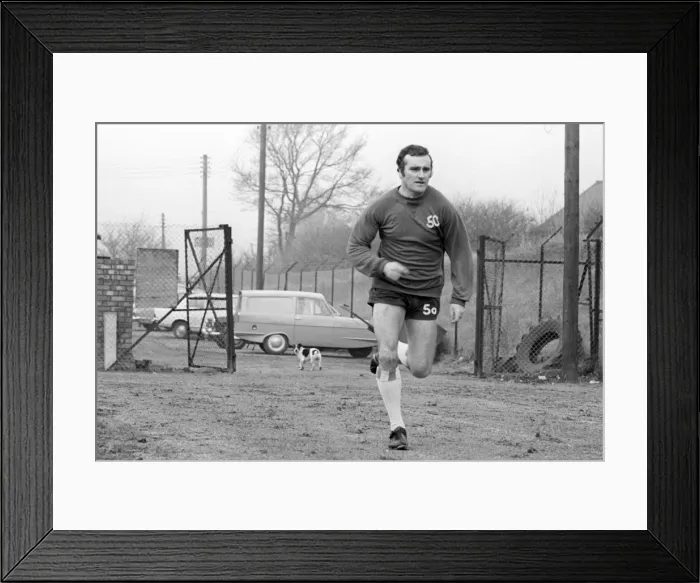 Framed Print : Noel Cantwell Sprints Ahead: Coventry City Manager's Intense Training Session with Surprising Canine Spectator (Former Managers) Framed Print : Noel Cantwell Sprints Ahead: Coventry City Manager's Intense Training Session with Surprising Canine Spectator (Former Managers)