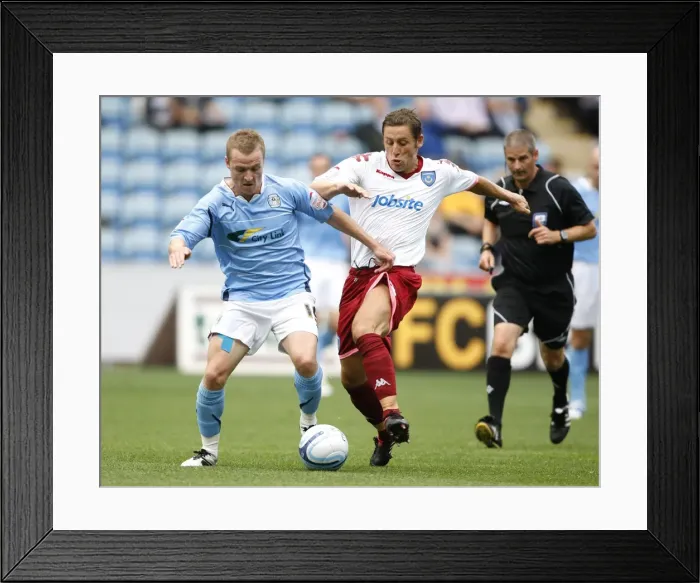 Framed Print : Coventry City vs Portsmouth: A Championship Showdown at Ricoh Arena (2010)