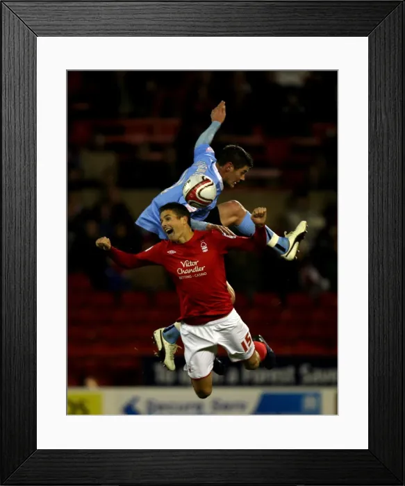 Framed Print : Chris Cohen vs. Lukas Jutkiewicz: A Championship Clash at Nottingham Forest's City Ground (Coventry City vs. Nottingham Forest, 09-11-2010) Framed Print : Chris Cohen vs. Lukas Jutkiewicz: A Championship Clash at Nottingham Forest's City Ground (Coventry City vs. Nottingham Forest, 09-11-2010)