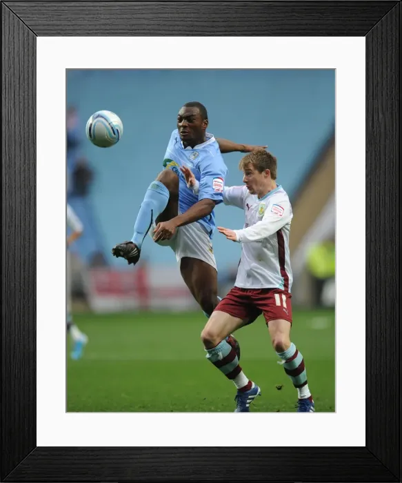 Framed Print : Clash at Ricoh Arena: Wade Elliott vs. Nathan Cameron - Coventry City vs. Burnley, Championship 2010 Framed Print : Clash at Ricoh Arena: Wade Elliott vs. Nathan Cameron - Coventry City vs. Burnley, Championship 2010