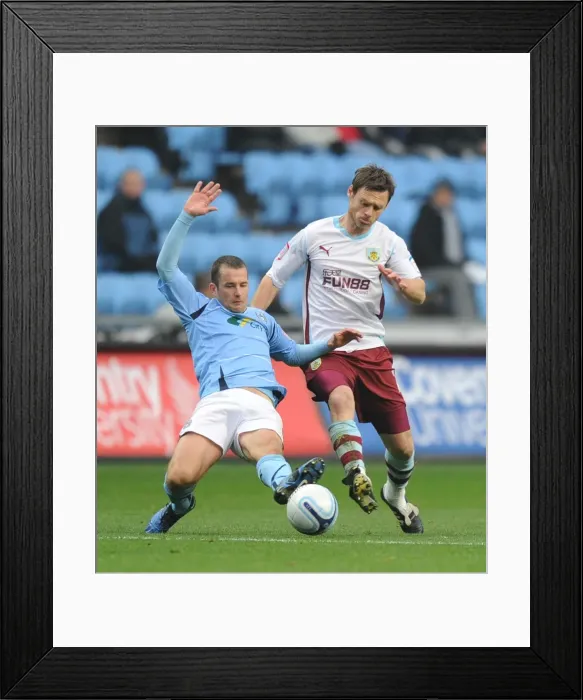 Framed Print : Clash of Leaders: Coventry City vs Burnley, Npower Championship - Michael Doyle vs Graham Alexander (2010) Framed Print : Clash of Leaders: Coventry City vs Burnley, Npower Championship - Michael Doyle vs Graham Alexander (2010)