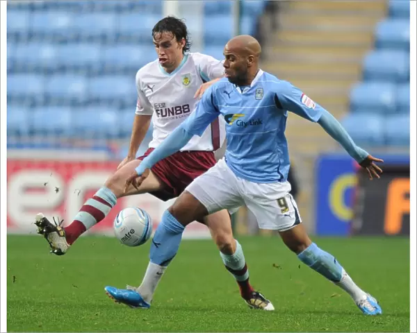 Marlon King vs Michael Duff: Intense Moment at Coventry City's Ricoh Arena during Npower Championship Match against Burnley (20-11-2010)