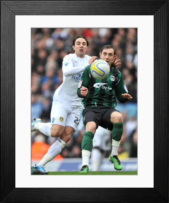 Framed Print : Battle for Supremacy: Davide Somma vs. Richard Keogh in the Npower Championship Clash between Leeds United and Coventry City at Elland Road Framed Print : Battle for Supremacy: Davide Somma vs. Richard Keogh in the Npower Championship Clash between Leeds United and Coventry City at Elland Road