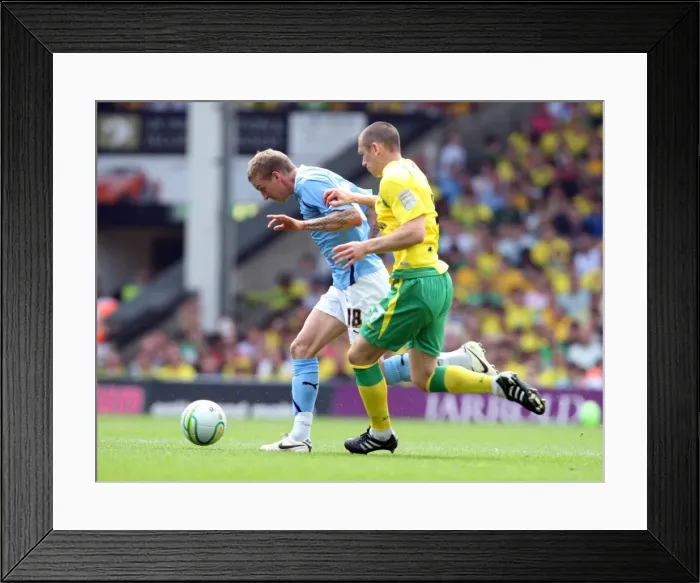 Framed Print : Carl Baker vs. Andrew Crofts: Intense Battle for Ball Possession in Coventry City vs. Norwich City Championship Clash (07-05-2011) Framed Print : Carl Baker vs. Andrew Crofts: Intense Battle for Ball Possession in Coventry City vs. Norwich City Championship Clash (07-05-2011)