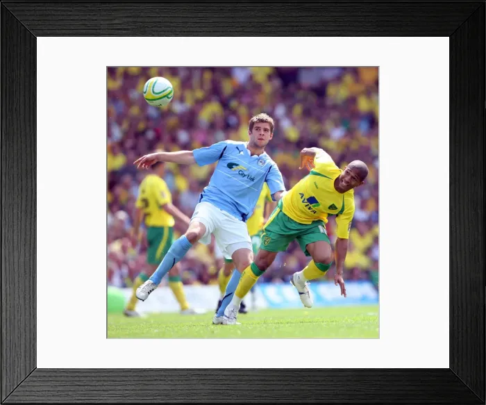 Framed Print : Intense Rivalry: Simeon Jackson vs. Martin Cranie Clash in Coventry City vs. Norwich City Championship Showdown Framed Print : Intense Rivalry: Simeon Jackson vs. Martin Cranie Clash in Coventry City vs. Norwich City Championship Showdown